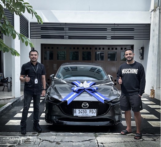 Delivery Mazda Car