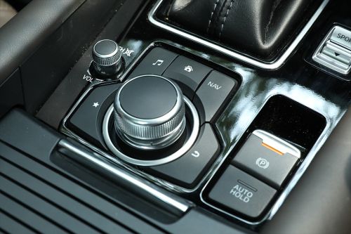 Tombol start-stop mesin Mazda Fronte